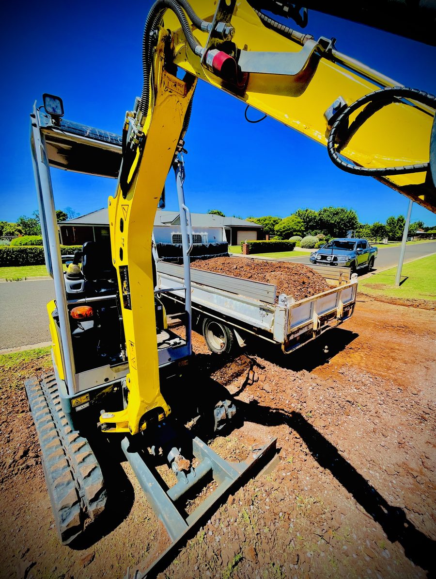 Riverina Diggers excavator loading spoil into the tipper truck on a Griffith job
